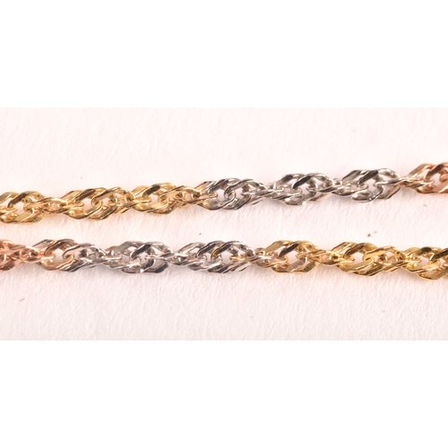 123 - A 18ct gold tri-colour chain, together with a large collection of costume jewellery, including vario... 