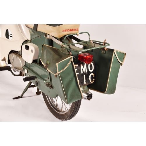 311 - A 1965 Honda C50 50cc moped, registration: EMO 61C, in green, with windshield and rear rack with pan... 