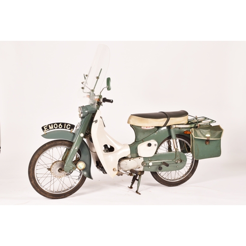 311 - A 1965 Honda C50 50cc moped, registration: EMO 61C, in green, with windshield and rear rack with pan... 