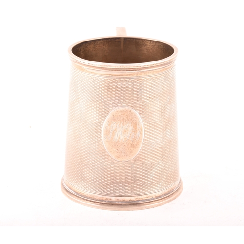 180 - A Victorian silver tankard, hallmarked London 1869 by Goldsmiths Alliance Ltd, 11cm high.