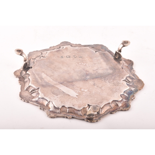 183 - A George III footed silver salver, ornate shell rim, engraved detail to surface, hallmarked for Lond... 