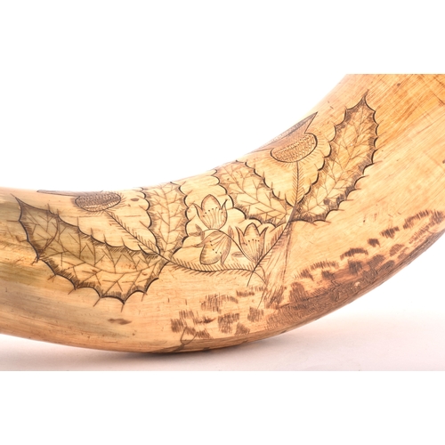 332 - A mid-19th century Scottish scrimshaw-decorated powder horn, featuring an incised profile of a man-o... 