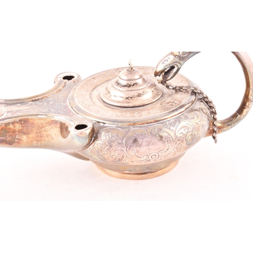 186 - A Victorian silver cigar lighter in the form of an oil lamp, one silver with ornate engraved decorat... 