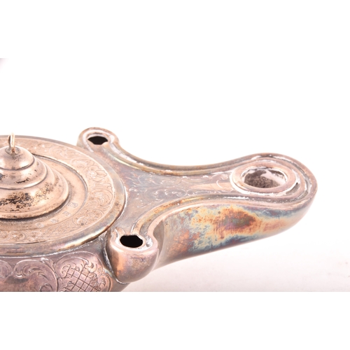 186 - A Victorian silver cigar lighter in the form of an oil lamp, one silver with ornate engraved decorat... 