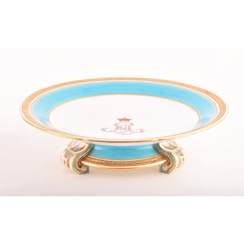 267 - A Minton Footed Cake Plate and tazza, with Earl's Coronet and initials S. M, under a turquoise ad ac... 