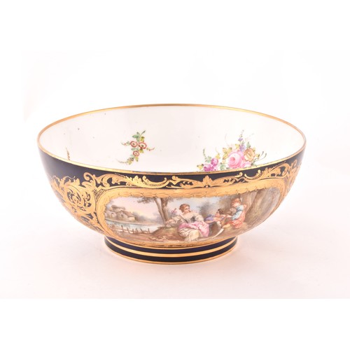 268 - A 19th century French Sevres porcelain bowl, painted with a pastoral scene of figures in a landscape... 