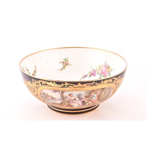 268 - A 19th century French Sevres porcelain bowl, painted with a pastoral scene of figures in a landscape... 