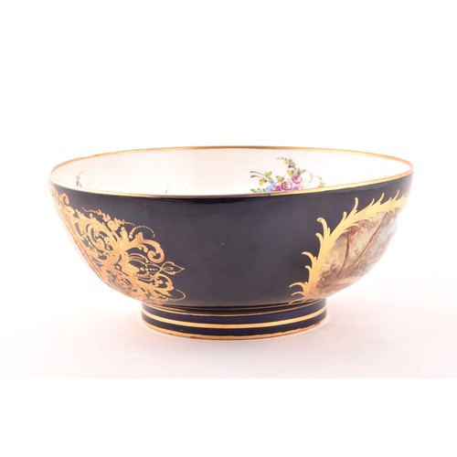 268 - A 19th century French Sevres porcelain bowl, painted with a pastoral scene of figures in a landscape... 