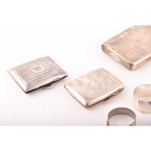 191 - A collection of silver items, including two Victorian napkin rings, two cigarette cases, one hallmar... 