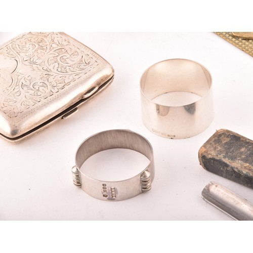 191 - A collection of silver items, including two Victorian napkin rings, two cigarette cases, one hallmar... 