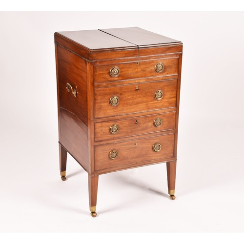 297 - A George III mahogany dressing chest, the top with a pair of flaps opening to reveal a fitted interi... 