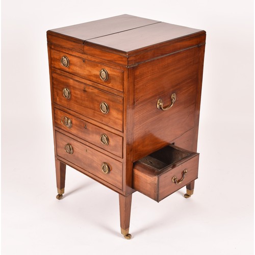 297 - A George III mahogany dressing chest, the top with a pair of flaps opening to reveal a fitted interi... 