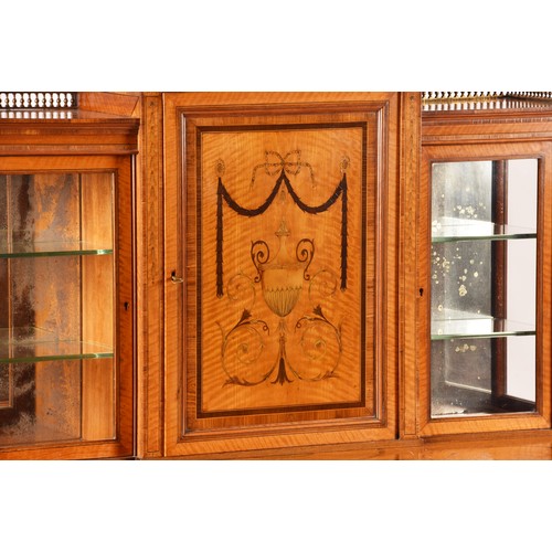 272 - Edwards and Roberts. A fine Edwardian satinwood inlaid desk / side cabinet, the galleried top over a... 