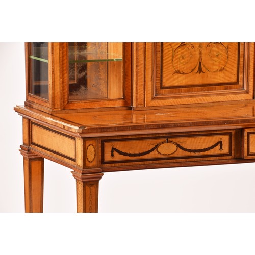 272 - Edwards and Roberts. A fine Edwardian satinwood inlaid desk / side cabinet, the galleried top over a... 