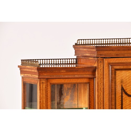 272 - Edwards and Roberts. A fine Edwardian satinwood inlaid desk / side cabinet, the galleried top over a... 