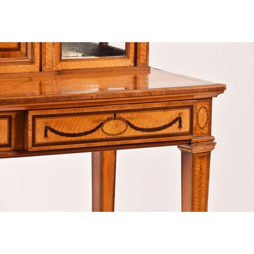 272 - Edwards and Roberts. A fine Edwardian satinwood inlaid desk / side cabinet, the galleried top over a... 