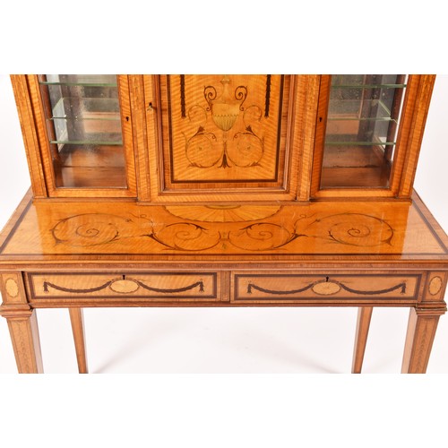 272 - Edwards and Roberts. A fine Edwardian satinwood inlaid desk / side cabinet, the galleried top over a... 