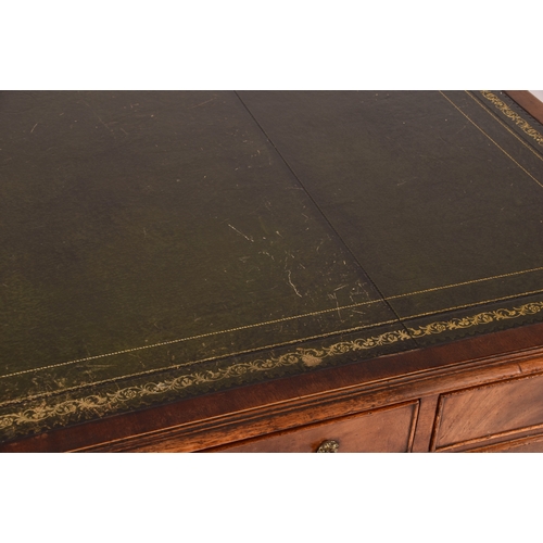 299 - A large mahogany pedestal desk, the green gilt tooled leather top over three frieze drawers, wit thr... 