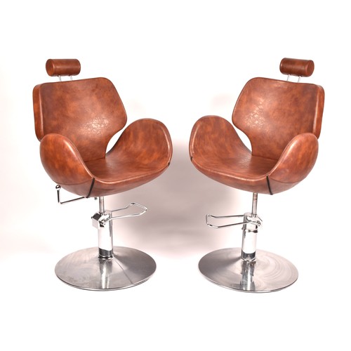 301 - A pair of Chloe tan leather styling / barber chairs, height adjustable, each with scallop shaped sea... 