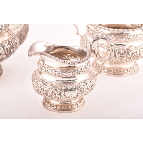 196 - A William IV three-piece Irish silver tea set, including a teapot, 16.5cm height x 29.5cm width, a s... 