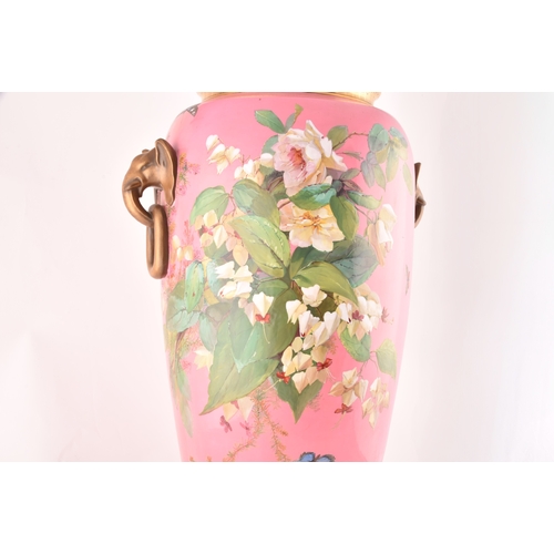 269 - A very large Minton porcelain pink ground vase by Richard Pilsbury. Richly painted on both sides wit... 