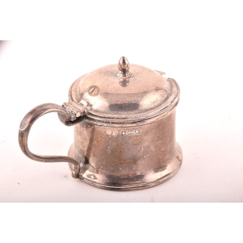 199 - A group of assorted silver items, including a brandy pan, a silver cup, condiment sets, toast rack, ... 