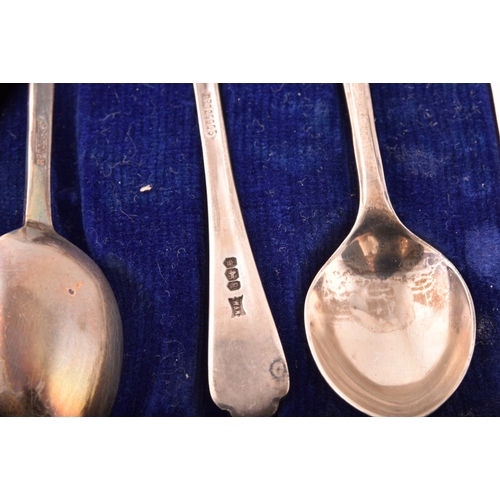 200 - A collection of assorted silver items, including several teaspoons, sugar cube tongs, hand held mirr... 