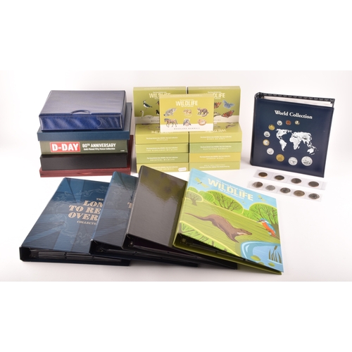 150 - A collection of assorted collectors coins sets, including The Wildlife collection in a folder and bo... 