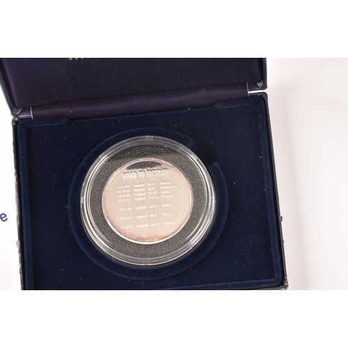 153 - A collection of commemorative silver coins, including the Queen Elizabeth II memorial fine silver pr... 