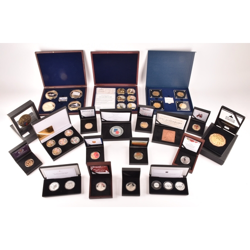 154 - A collection of silver collectors coins sets, including the 70th anniversary of the Queen's Coronati... 