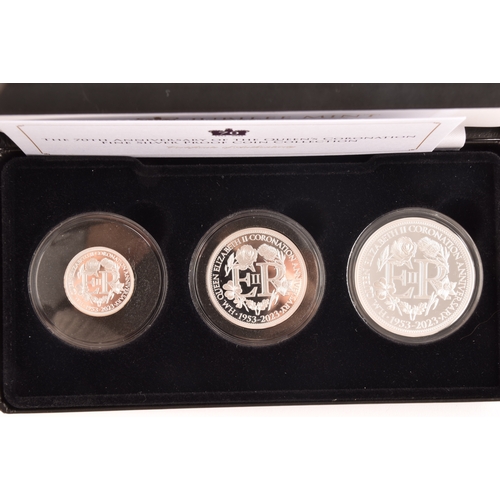 154 - A collection of silver collectors coins sets, including the 70th anniversary of the Queen's Coronati... 