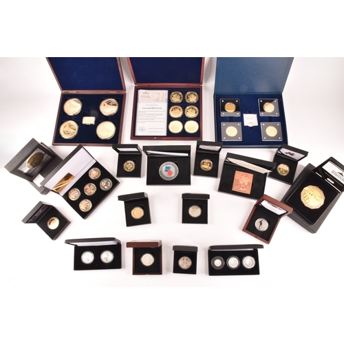 154 - A collection of silver collectors coins sets, including the 70th anniversary of the Queen's Coronati... 