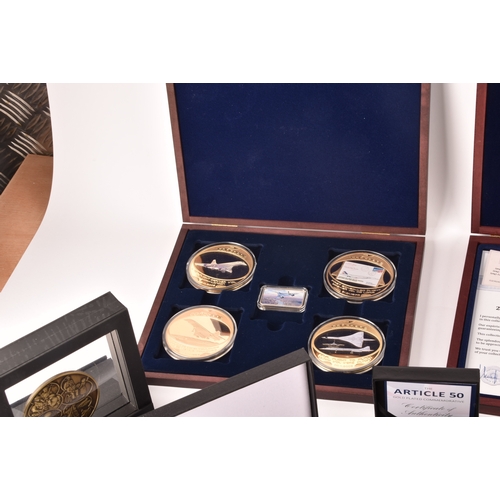 154 - A collection of silver collectors coins sets, including the 70th anniversary of the Queen's Coronati... 