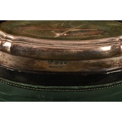 201 - A travelling leather suitcase, with fitted silver interior, inlaid with green material, by Goldsmith... 