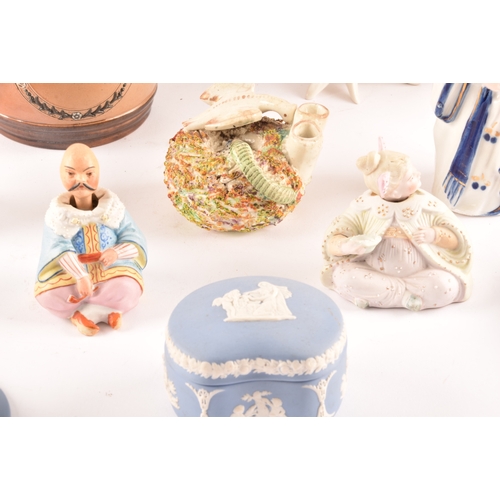 270 - A collection of assorted continental ceramics, including a pair of porcelain parakeets, a set of thr... 