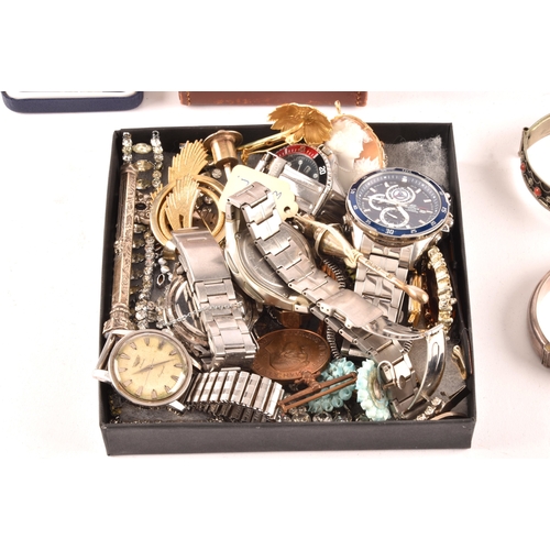 127 - A group of assorted objects, including a Longines Conquest automatic wristwatch, along with four oth... 