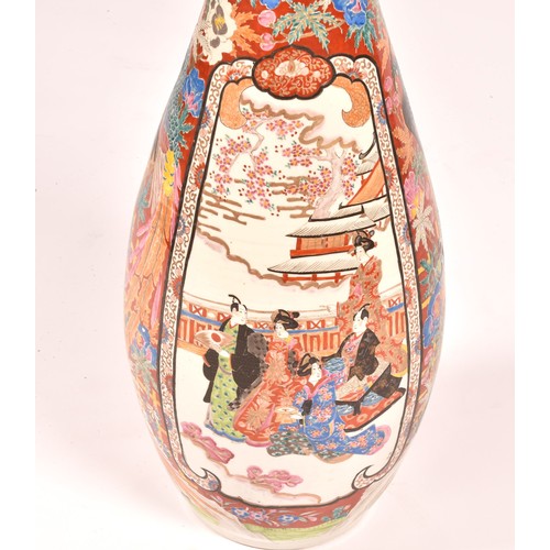 242 - A large late 19th century Japanese Arita vase, of trumpet form with scalloped lip in the Imari palet... 