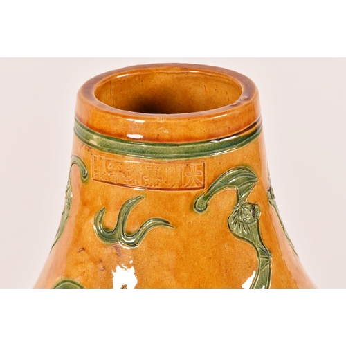 243 - A very large pair of Chinese yellow glazed doubled gourd garden vases, decorated in green with bats ... 