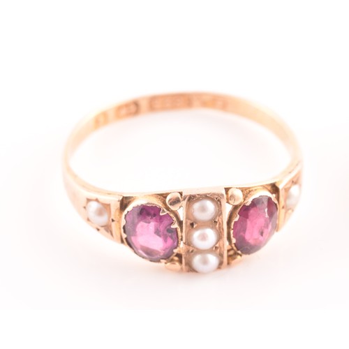 120 - A Victorian 15ct yellow gold garnet and seed pearl ring, hallmarked for Birmingham 1879, indistinct ... 