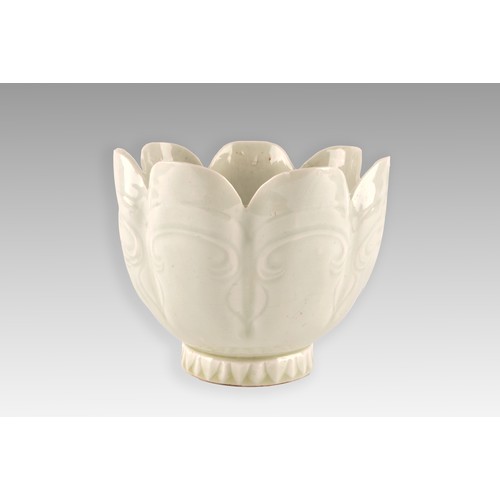 288 - A Chinese blanc de china lotus bowl, with seven petal loves, with engraved scroll decoration, the fo... 