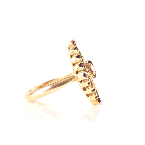 98 - A 9ct yellow gold marquise cluster ring, set to centre with a oval garnet, surrounded by round garne... 