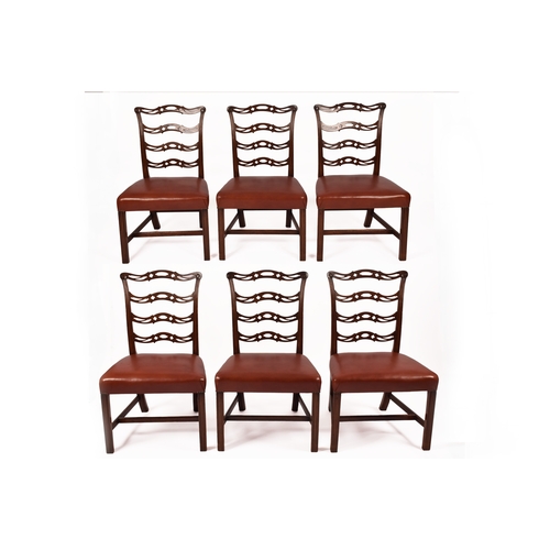 366 - A set of six Georgian design dining chairs, with carved and pierced backs and overstuffed leather se... 