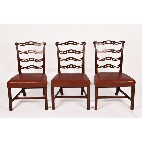 366 - A set of six Georgian design dining chairs, with carved and pierced backs and overstuffed leather se... 