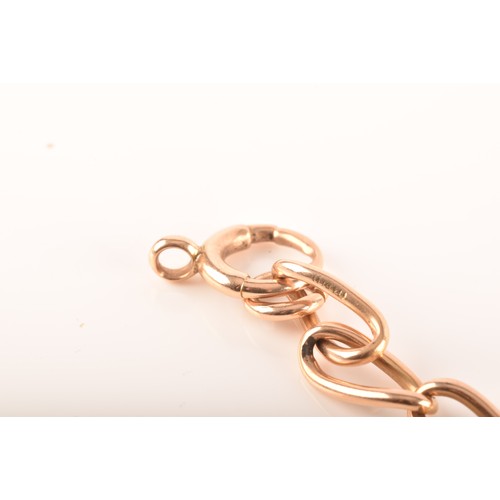 4 - A 15ct yellow gold oval link chain, hallmarked to each link, 40cm long.