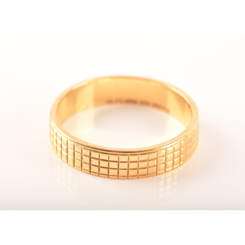 35 - A pair of two 22ct yellow gold wedding bands, with linear engraving, partial hallmarks for London, o... 