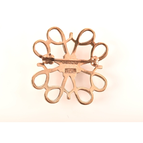 69 - A 15ct yellow gold and nephrite twist brooch, together with a 9ct rose gold bow brooch and a 9ct yel... 