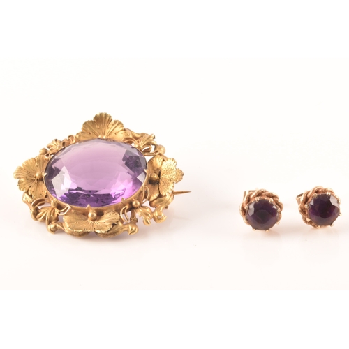 102 - A pair of 9ct gold amethyst earrings, together with a yellow metal amethyst brooch. (2)