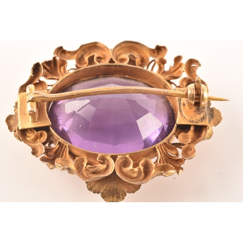 102 - A pair of 9ct gold amethyst earrings, together with a yellow metal amethyst brooch. (2)