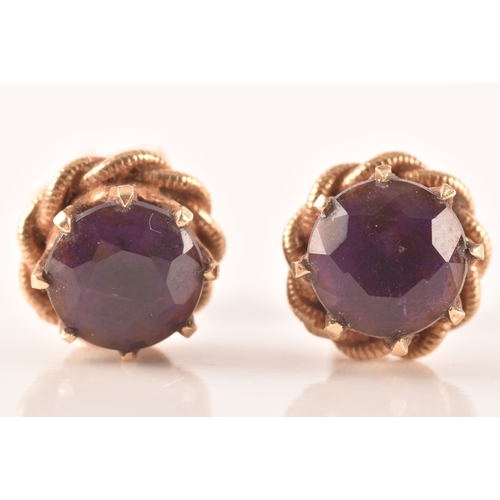 102 - A pair of 9ct gold amethyst earrings, together with a yellow metal amethyst brooch. (2)