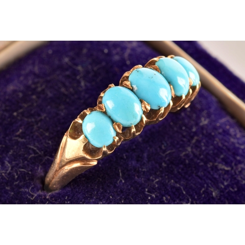 104 - A yellow metal ring, set with five oval cabochon turquoise, size N.